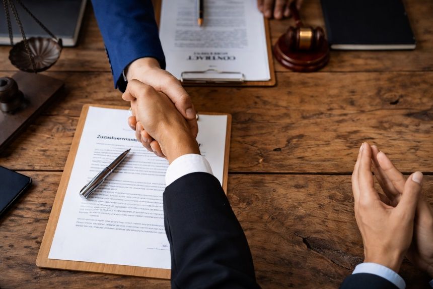 Two business professionals shaking hands